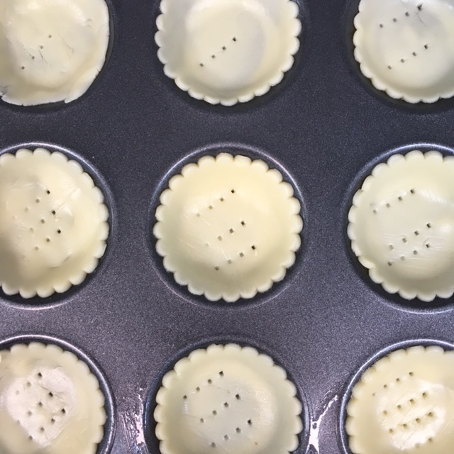 Adding Cut Pastry Into Mini Tart Tin