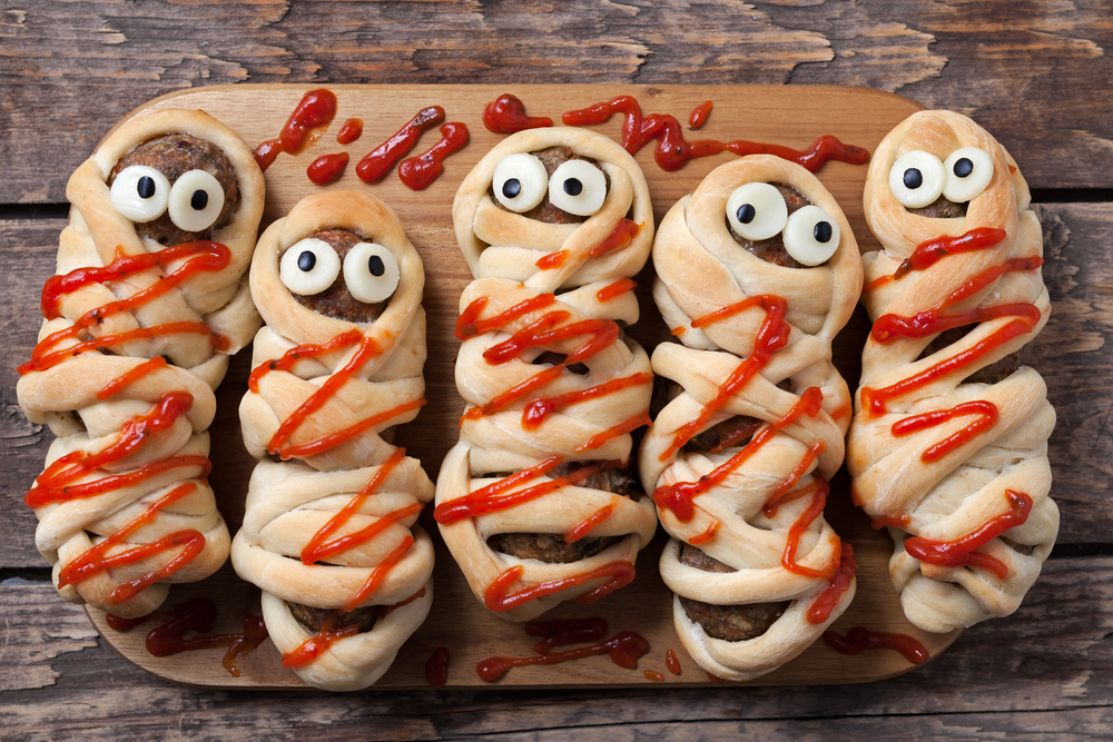 Sausage wrapped in Pastry covered in Ketchup. Made to look like Mummies.
