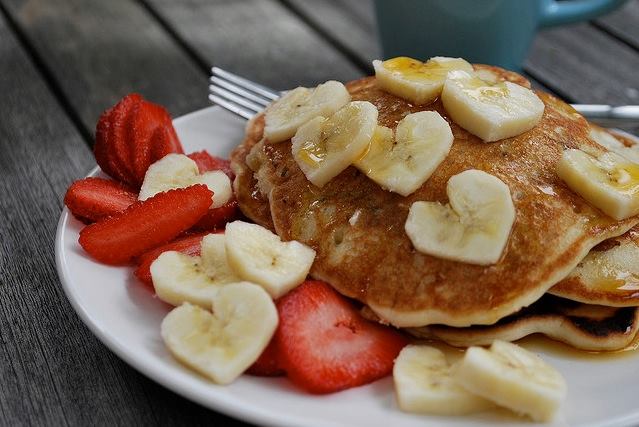 Pancake with Heart-Shaped Banana Slices and Strawberrys